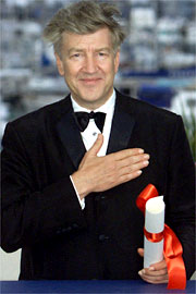 David Lynch with his hand over his heart